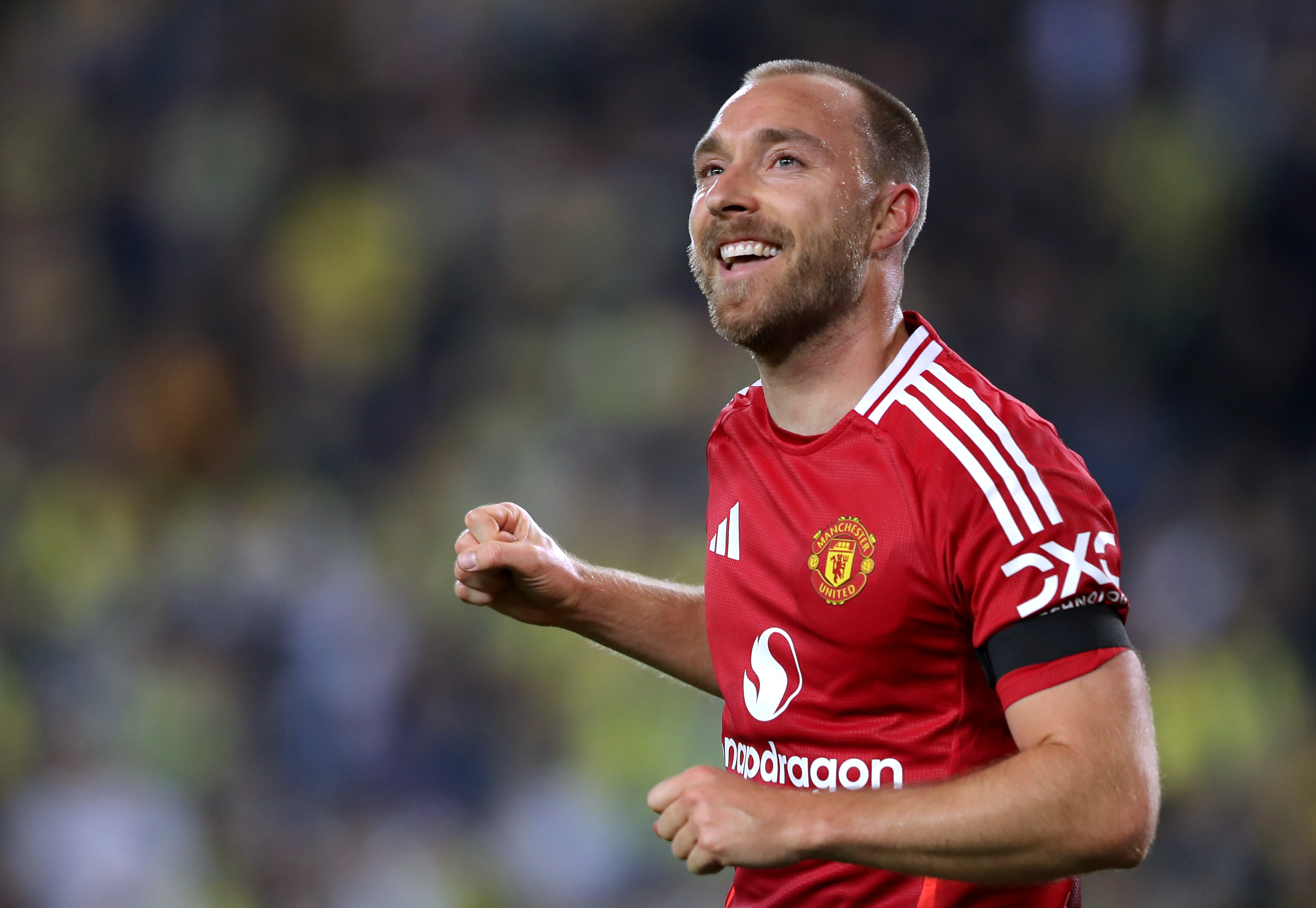 Christian Eriksen celebrates