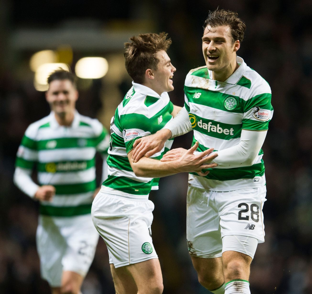 James Forrest congratulates Erik Sviatchenko