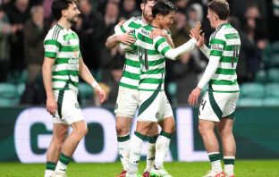 Reo Hatate celebrates