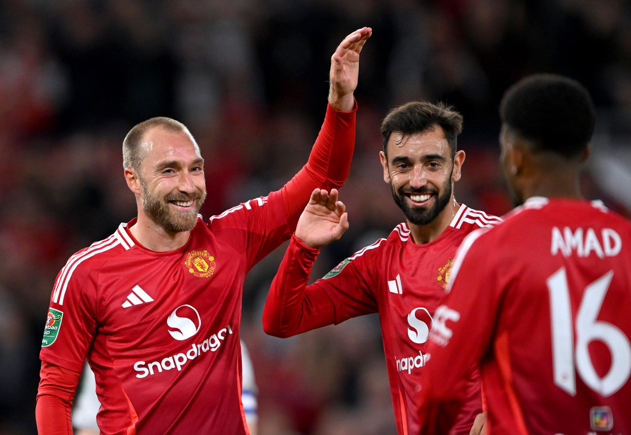 Christian Eriksen celebrates