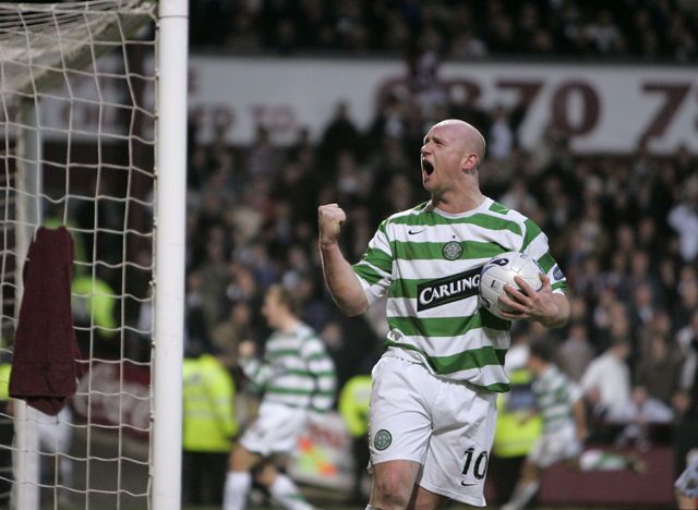 John Hartosn celebrates