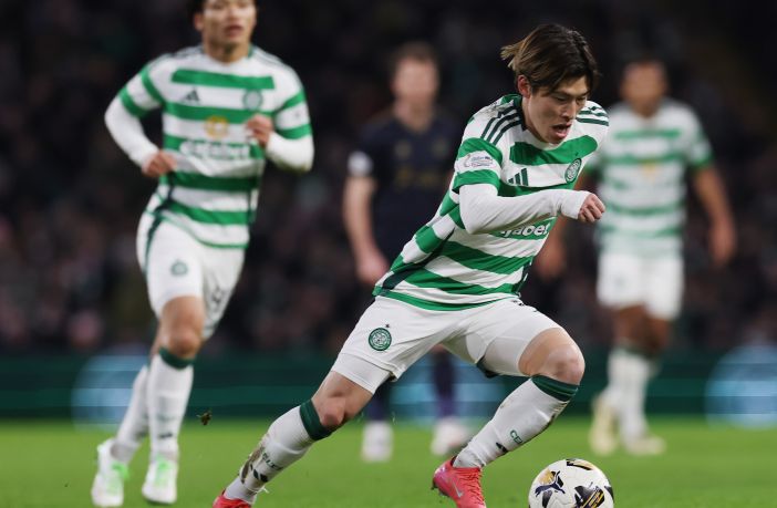 Kyogo runs with the ball