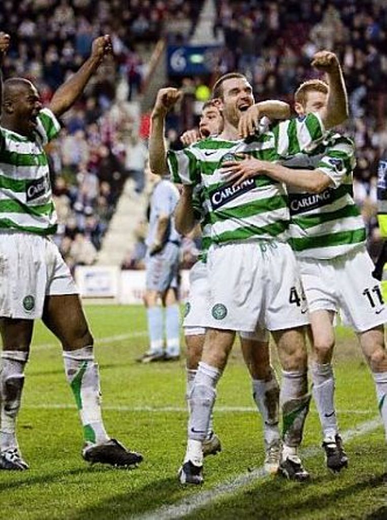 John Hartosn celebrates