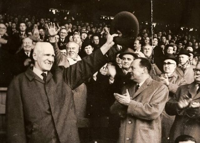 Jock Stein and the Celtic players congratulate Sir Bob Kelly