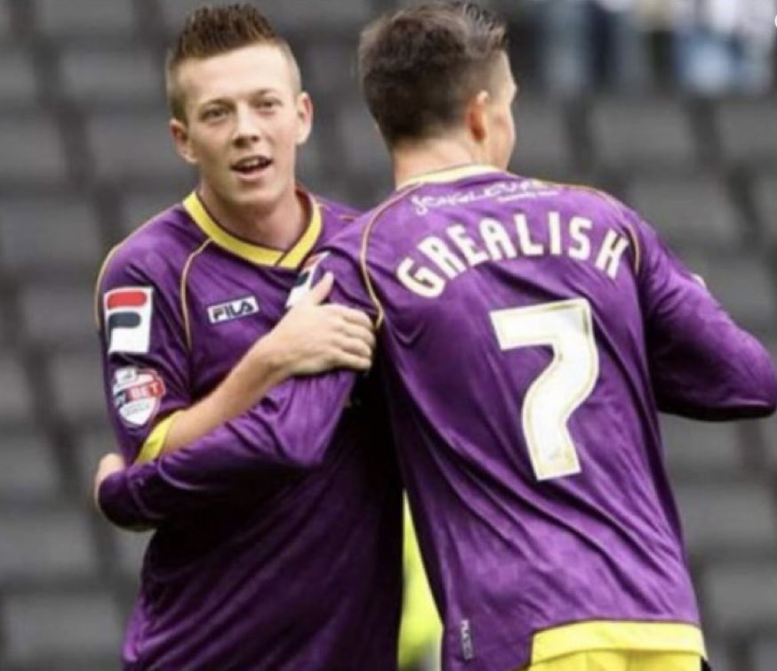 Callum McGregor with Jack Grealish 