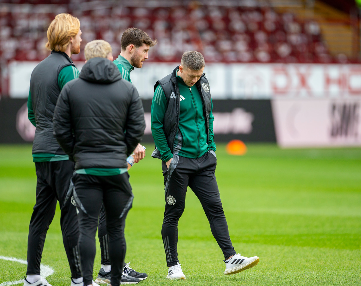 Players examine the pitch 