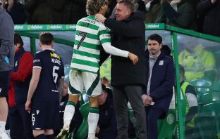 Jota embraces Brendan Rodgers