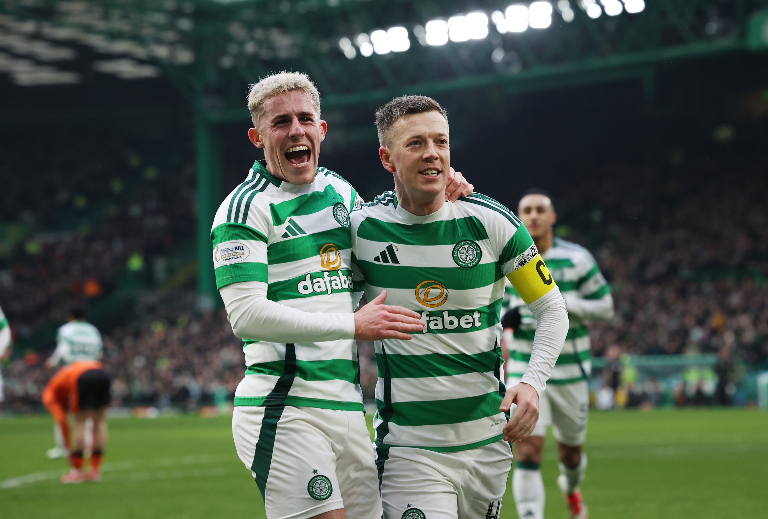 Callum McGregor celebrates with Luke McCowan