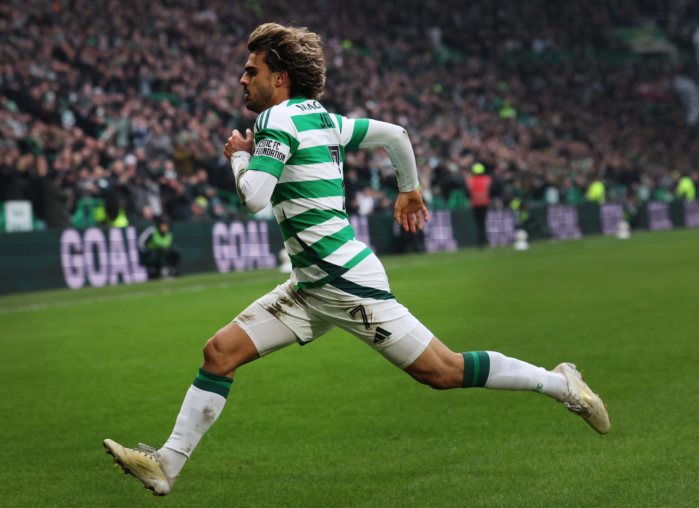Jota of Celtic celebrates
