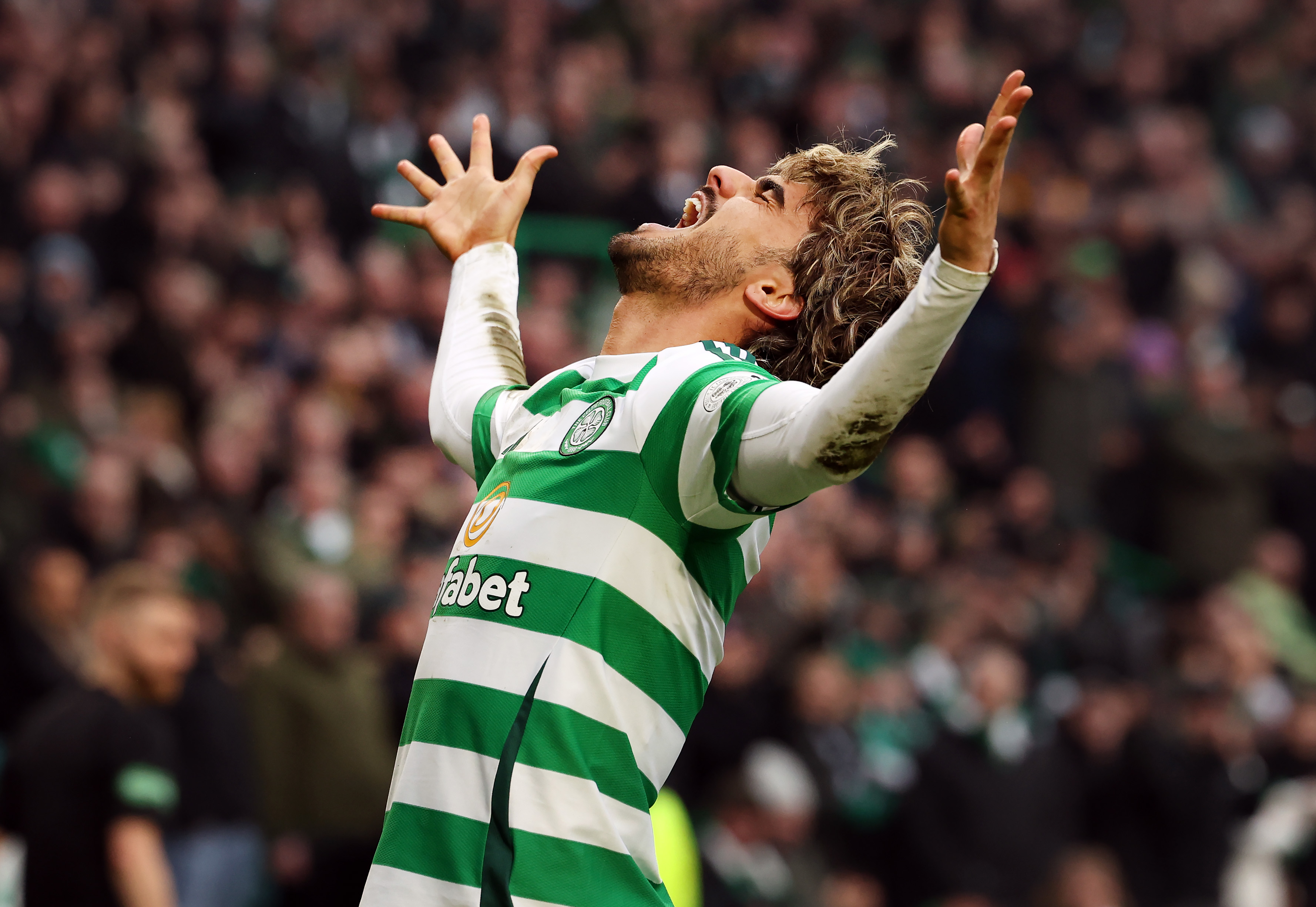 Jota of Celtic celebrates