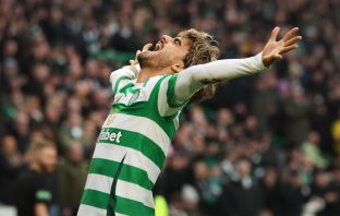 Jota of Celtic celebrates