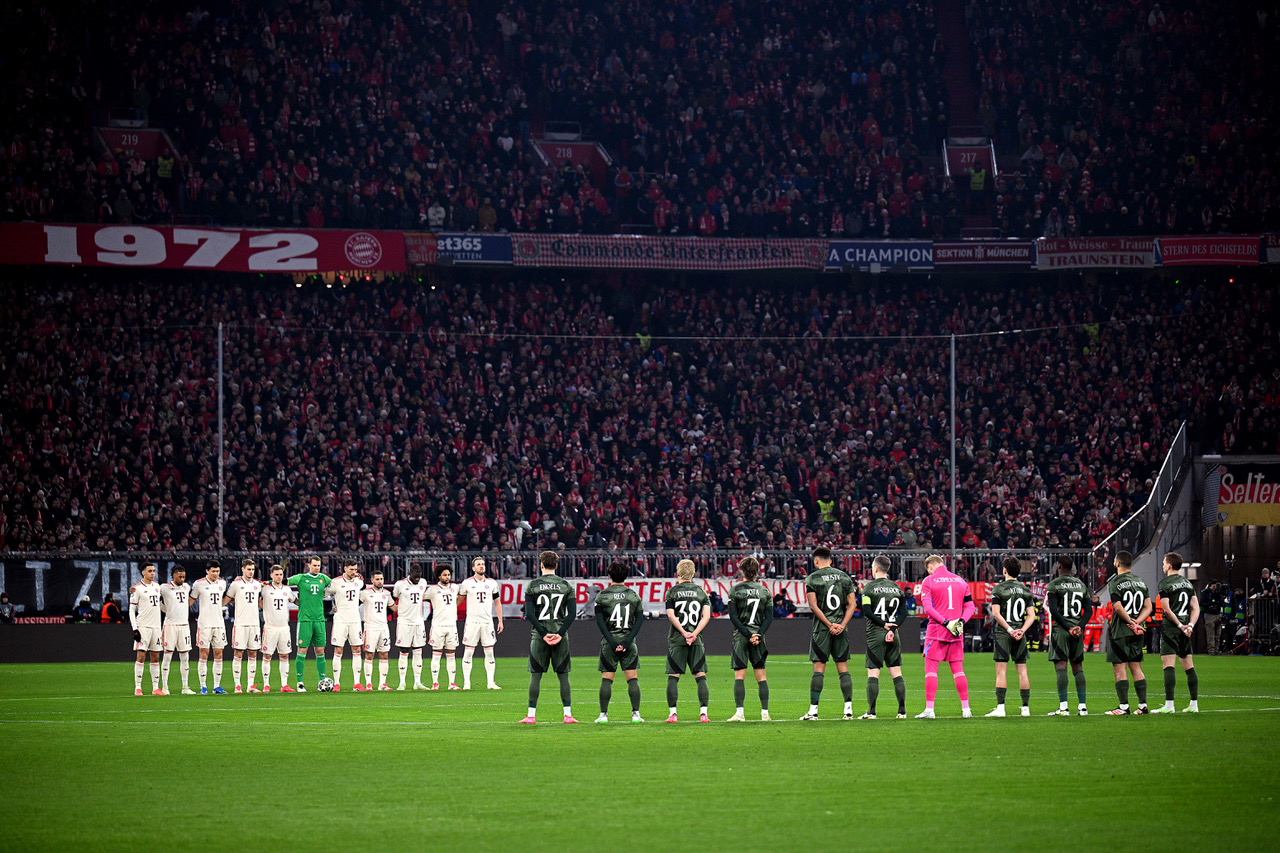 Players observe a minutes silence