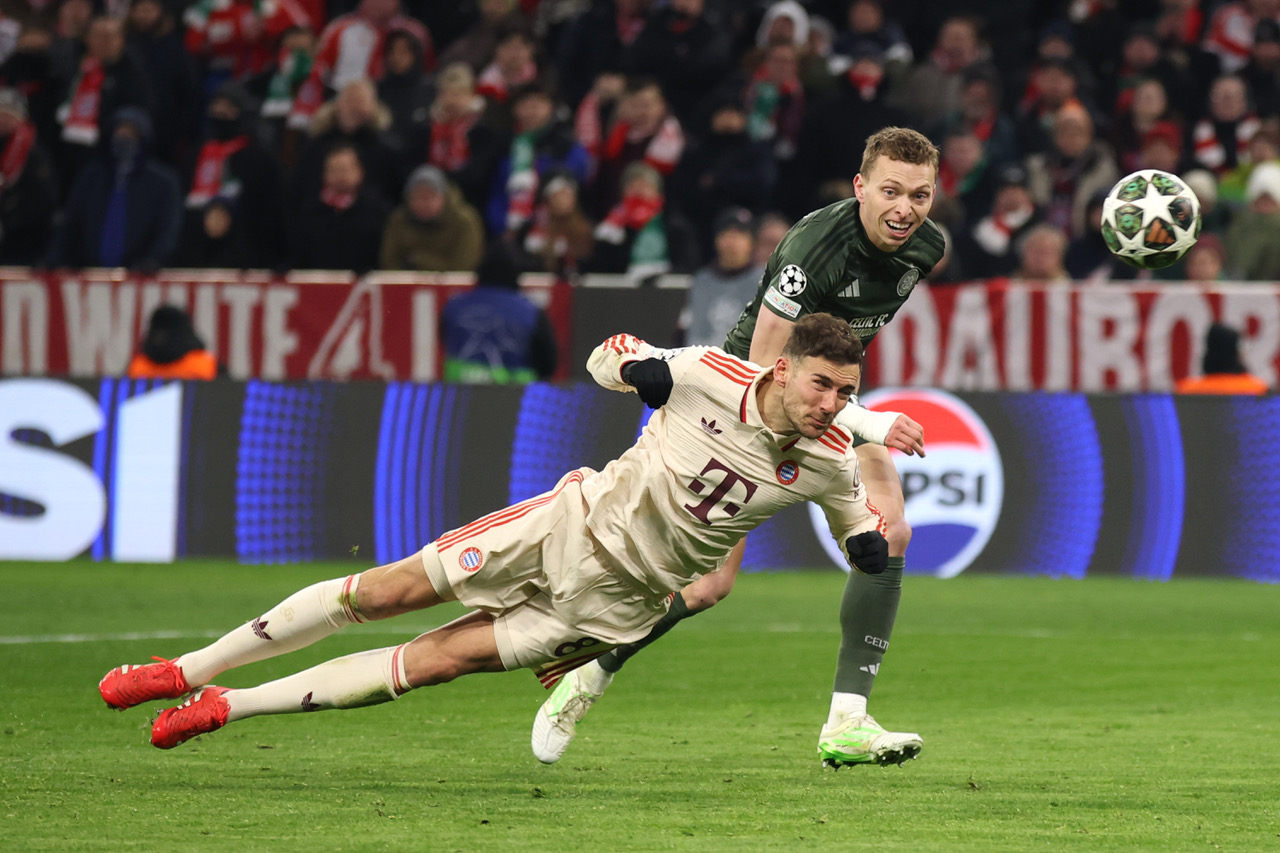 Leon Goretzka challenged by Alistair Johnston