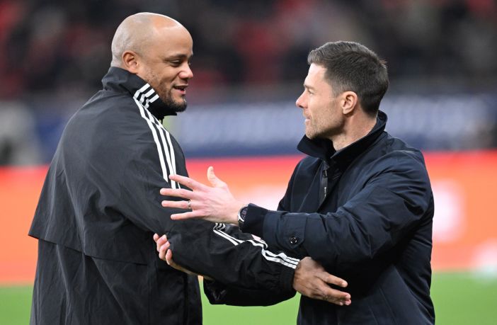 Vincent Kompany and Xabi Alonso