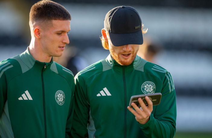 Johnny Kenny and Liam Scales checking the results