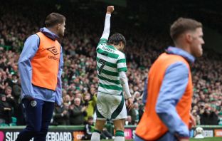 Jota of Celtic celebrates