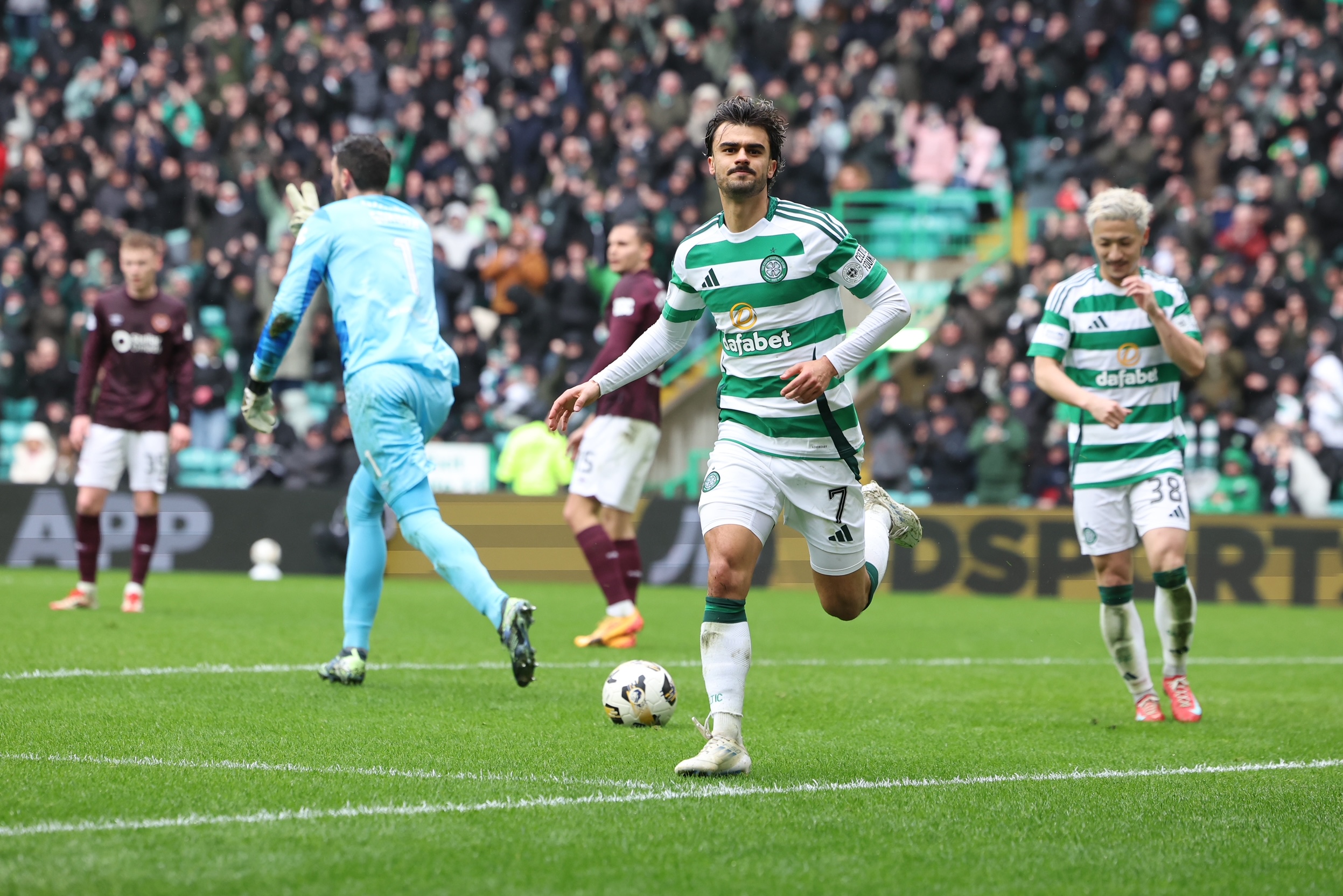 Jota celebrates after scoring