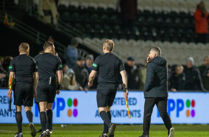Stephen Robinson not happy with the match officials.