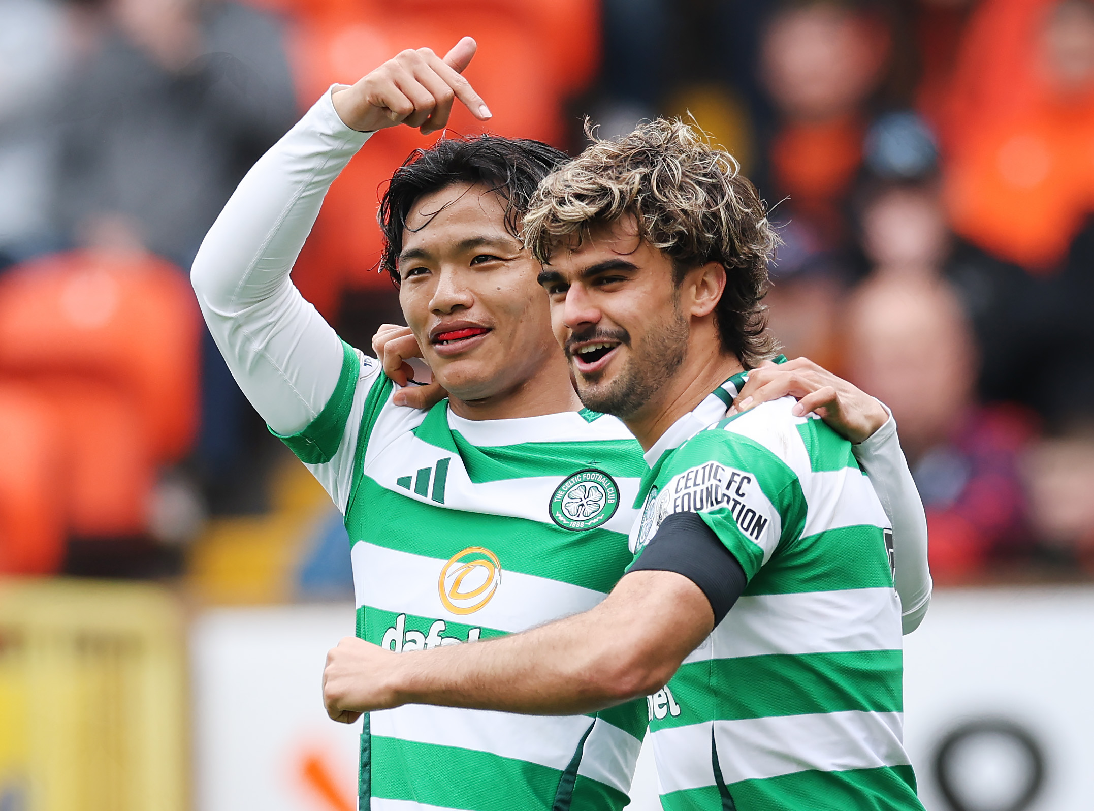 Reo Hatate and Jota celebrate