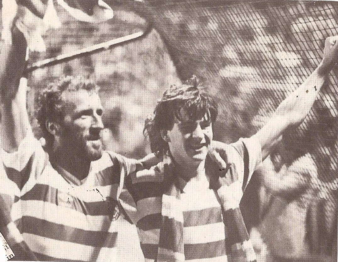 Danny McGrain and Charlie Nicolas celebrate