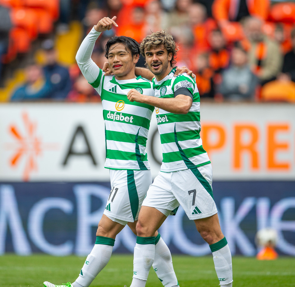 Jota and Reo Hatate celebrate.