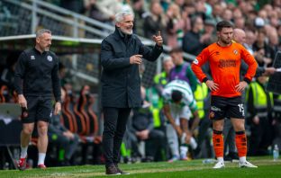 Jim Goodwin looks on