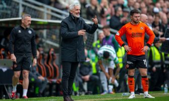 Jim Goodwin looks on