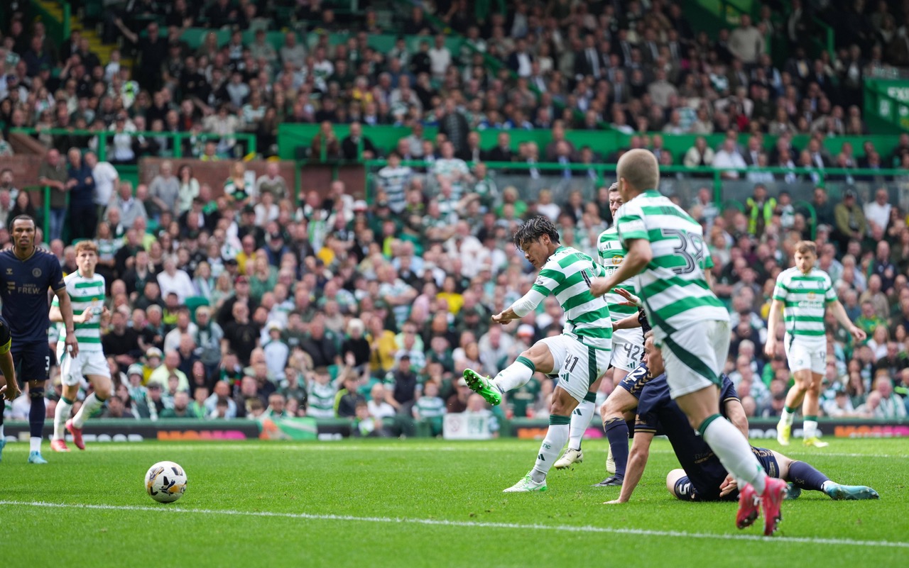 Reo Hatate of Celtic scores