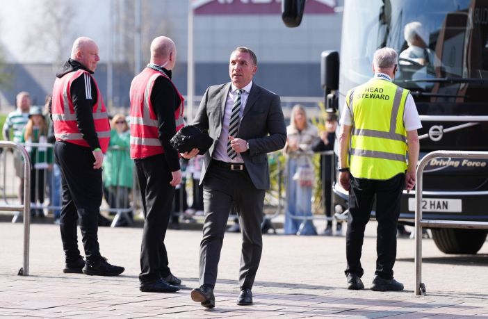 Brendan Rodgers steps off the Celtic team bus