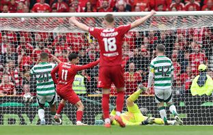 Kasper Schmeichel of Celtic concedes an own goal