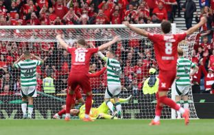 Kasper Schmeichel of Celtic concedes an own goal