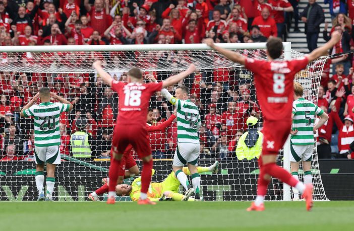 Kasper Schmeichel of Celtic concedes an own goal