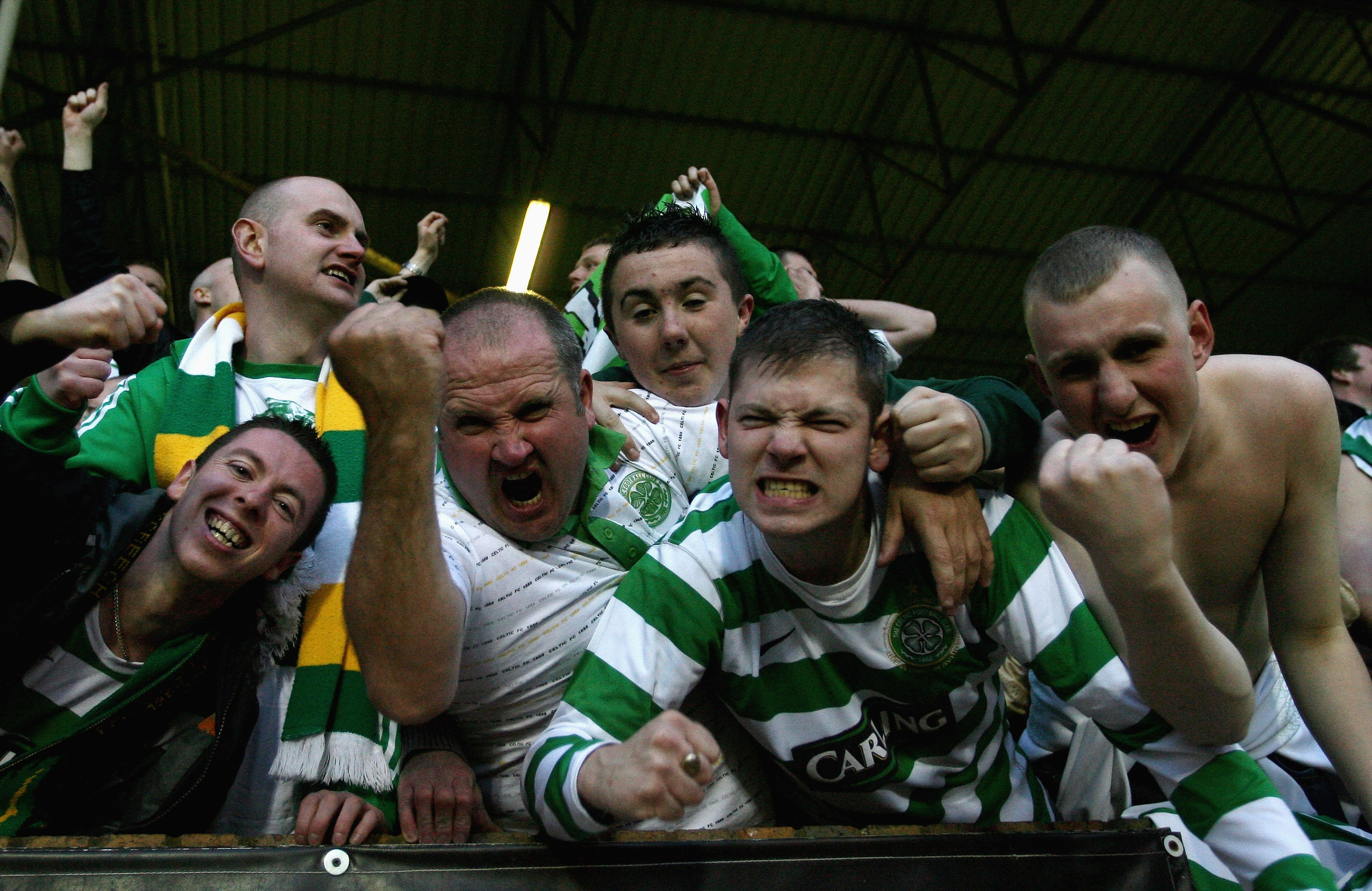 Celtic fans celebrate after Jan Vennegoor of Hesselink scores