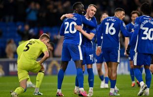 Famara Diedhiou of Cardiff City celebrates with David Turnbull