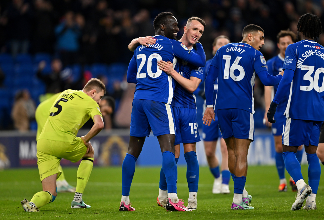 Famara Diedhiou of Cardiff City celebrates with David Turnbull