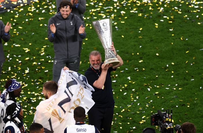 Ange Postecoglou lifts the Europa League Trophy
