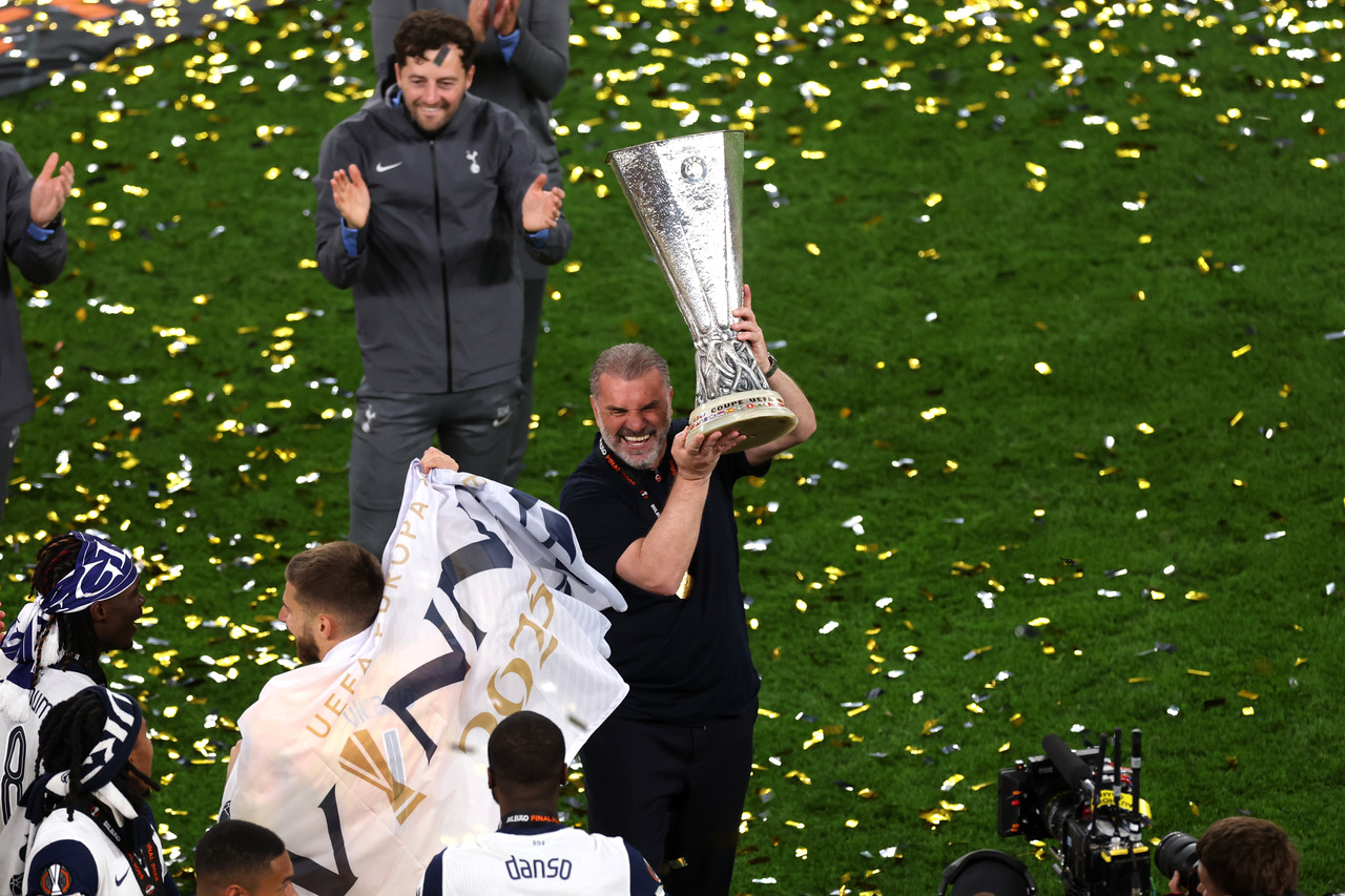 Ange Postecoglou lifts the Europa League Trophy