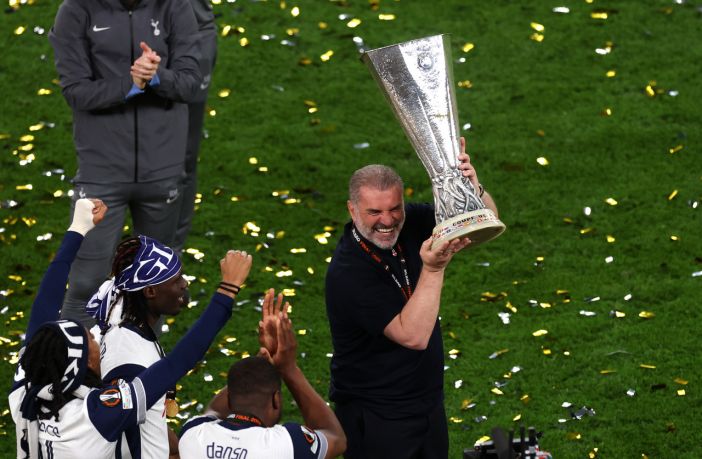 Ange Postecoglou lifts the Europa League Trophy