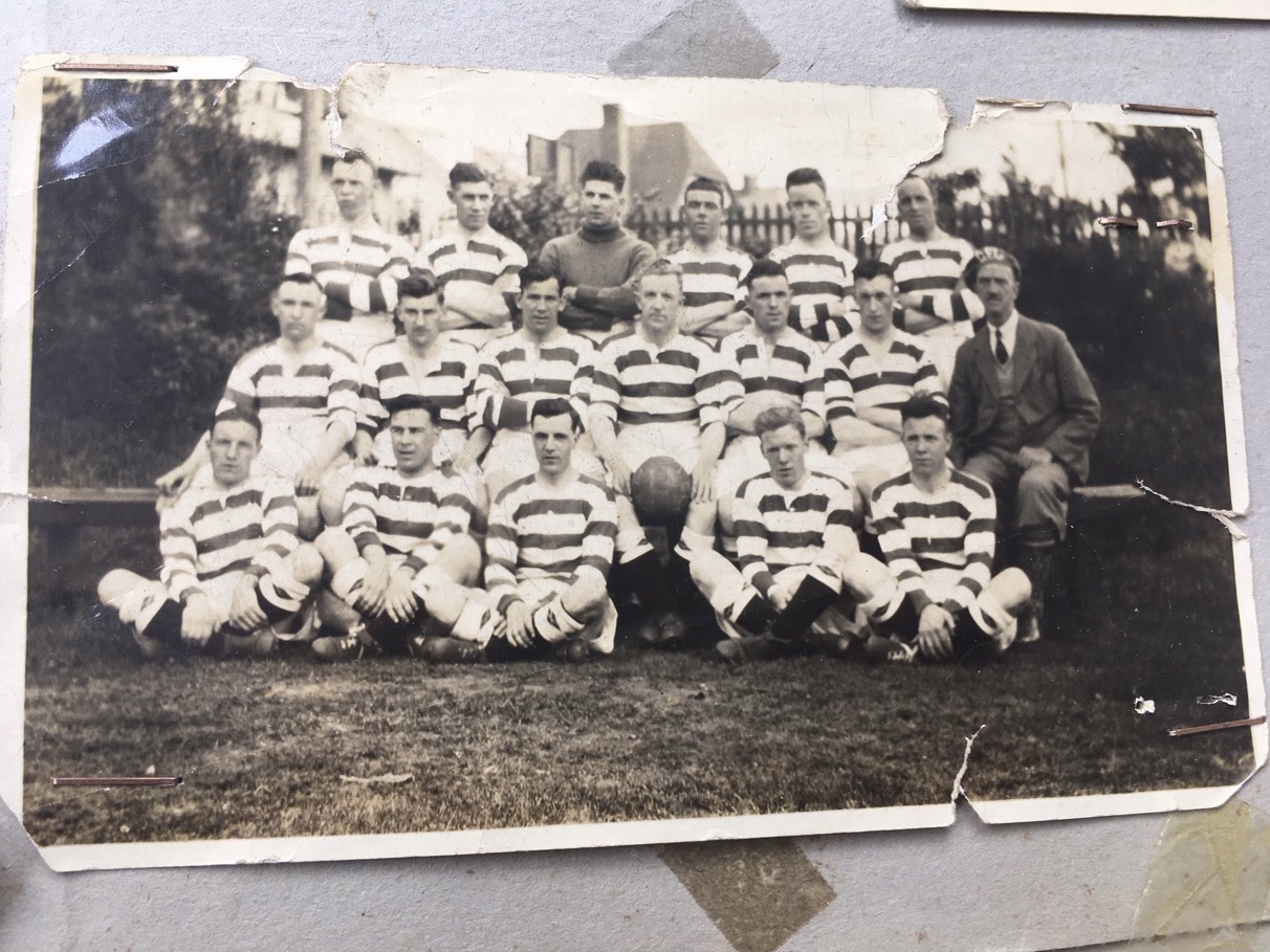 Will Quinn (seated on the right) wearing his beret 