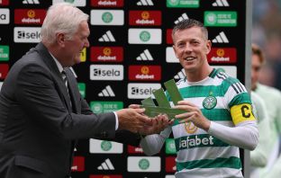Callum McGregor of Celtic is presented with the Adidas Trophy by Roy Aitken