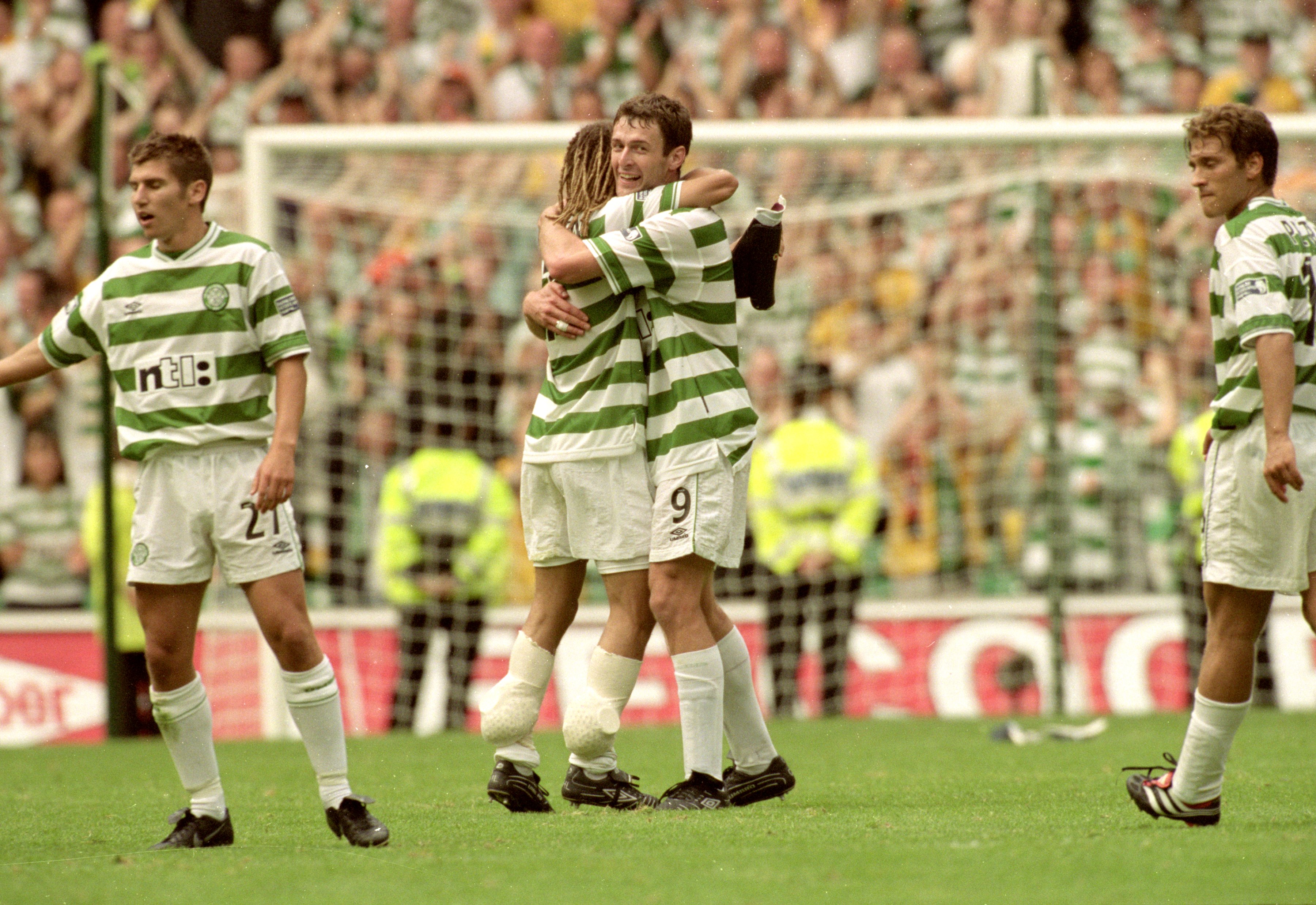 Chris Sutton and Henrik Larsson celebrate 