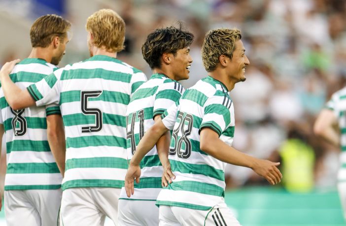 Reo Hatate celebrates