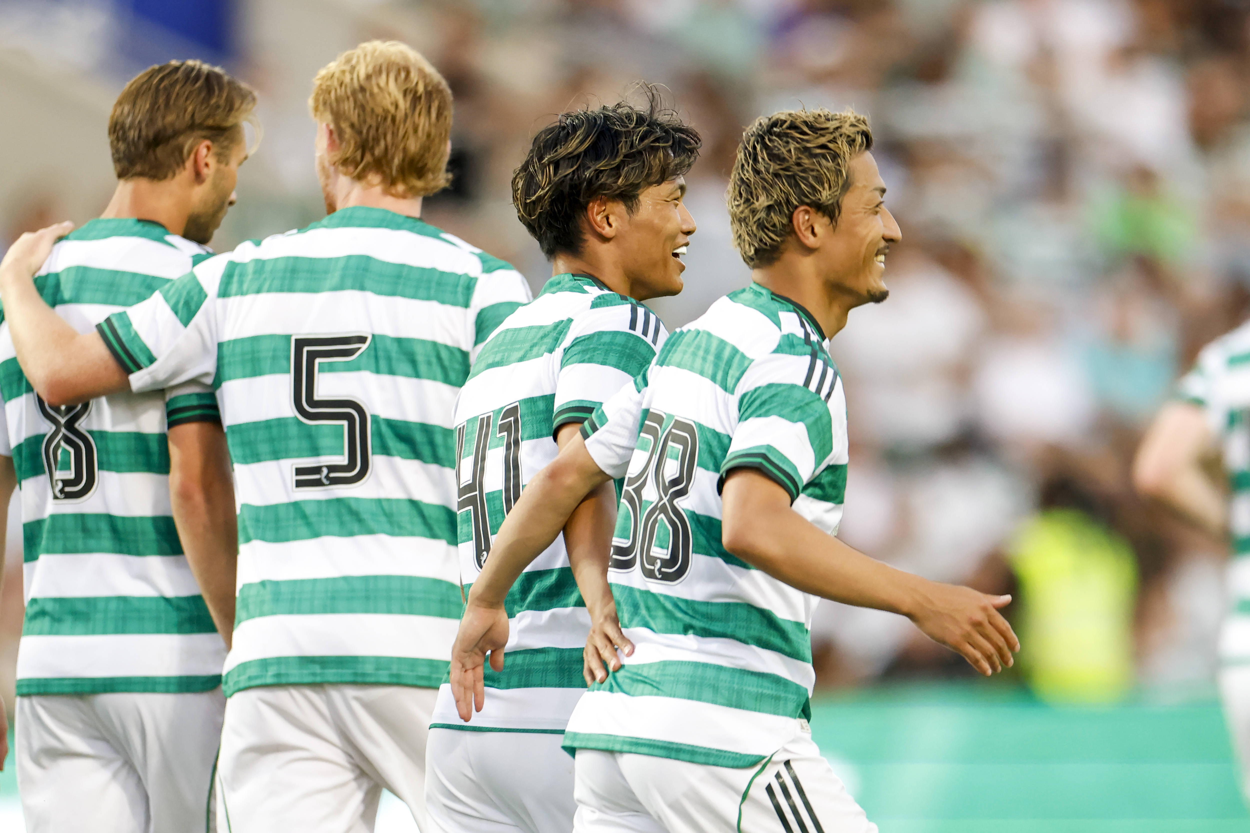 Reo Hatate celebrates