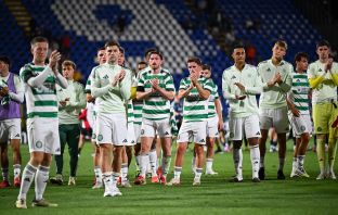 Celtic players applaud the Celtic support