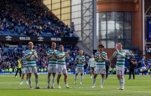 Celtic players acknowledge the Celtic support
