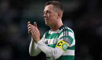 Callum McGregor applauds the fans