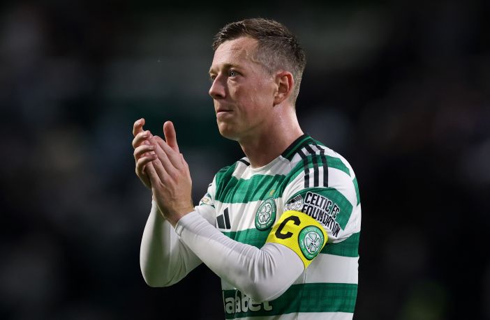 Callum McGregor applauds the fans