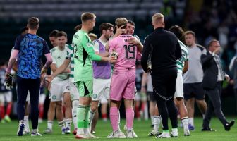 James Forrest of Celtic and Scott Bain of Falkirk embrace