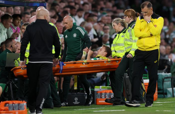Alistair Johnston of Celtic is stretchered off