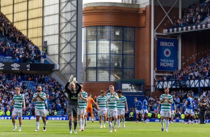 Celtic players acknowledge the Celtic support